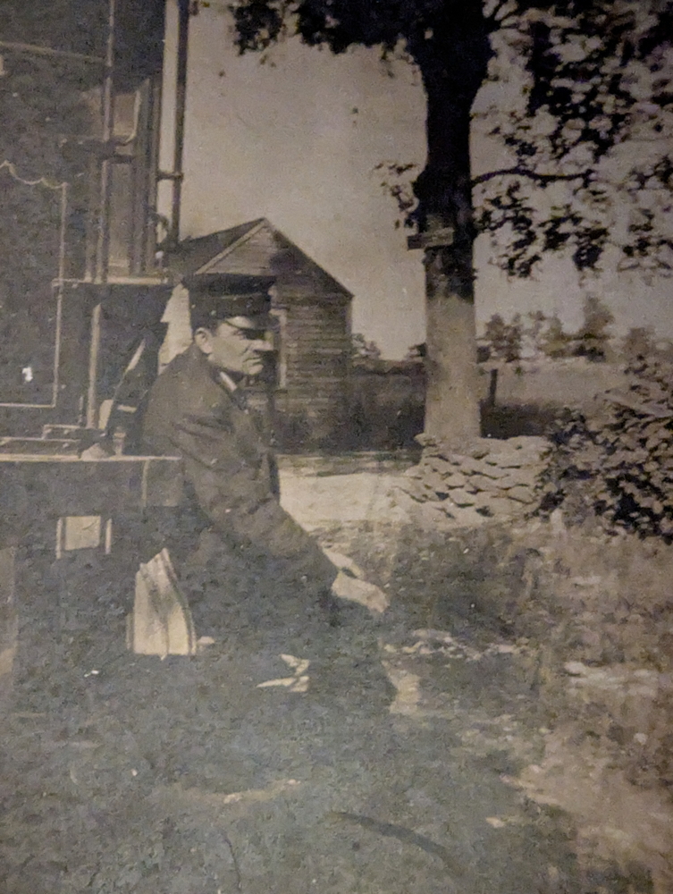 Photo of Man Sitting on Train Car